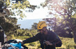 © Pedro Merino/Stocksy - Forest agent taking the safety equipment
