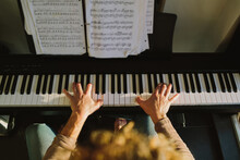Anonymous Man’s Hands Playing The Piano