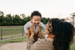 © Kristen Curette & Daemaine Hines/Stocksy - A young mother and her baby enjoying the outdoors
