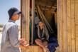 © Lupe Rodríguez/Stocksy - portrait in surf shop
