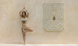 © Eyes on Asia/Stocksy - Tatooed woman in Yoga flow