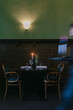 © VISUALSPECTRUM/Stocksy - Waiter Serving Red Wine in Fancy Restaurant