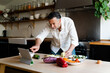 © Nuria Seguí/Stocksy - Man Cooking At Home