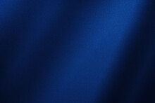 Abstract Dark Blue Background. Silk Satin. Navy Blue Color. Elegant Background With Space For Design. Soft Wavy Folds.