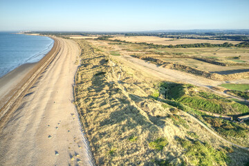  Aerial photo over the sand dunes that protect the Littlehampton golf course from the sea.