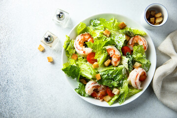 Wall Mural - Traditional Caesar salad with shrimps