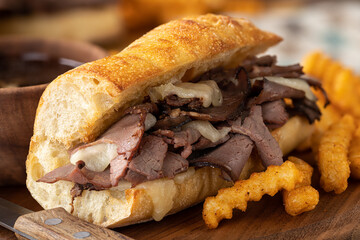 Wall Mural - French dip sandwich and bowl of au jus
