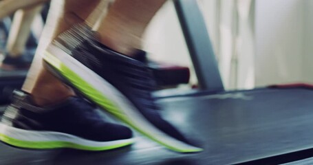 Canvas Print - Low angle legs running on a treadmill for fitness, health and active lifestyle in gym. Fit people, man and woman exercising or doing cardio workout endurance training with gyming equipment or machine