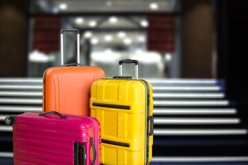 Canvas Print - Travel Fashion. Plastic Suitcases Standing At Empty Airport Corridor, Stylish Luggage Bags Waiting At Terminal Hall,