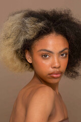 Studio portrait of woman with two toned hair