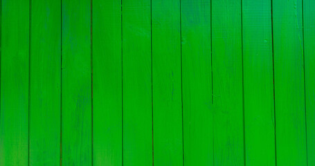 Wooden background in green color, Green Planks for St Patrick's Day design. Bright green wooden background, abstract wood texture