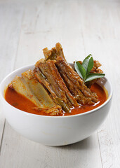 Wall Mural - Kari or Gulai Iga Kambing or is Indonesia Traditional mutton ribs curry soup. is a type of food containing rich and spicy.