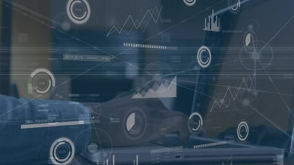 Poster - Animation of graph data processing over caucasian businessman working with laptops in office