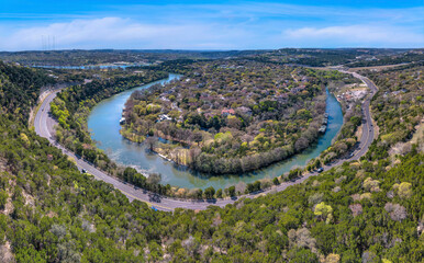 Wall Mural - Austin, Texas- View from top of a slope with highway at the bottom near the Colorado River