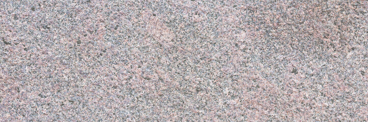 Wall Mural - Granite texture. Natural pink granite with a grainy pattern. Stone background. Solid rough surface of rock. Durable construction and decoration material. Close-up.