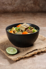 Canvas Print - Soto Sapi or Soto Daging, is an Indonesian special soup made from beef broth with meat cutlet. Popular menu for Idul Adha