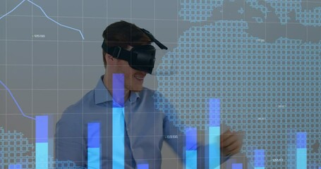 Poster - Animation of graphs over world map over caucasian man wearing vr headset boxing