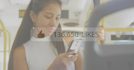 Poster - Animation of like icons with increasing numbers against asian woman using smartphone in the bus