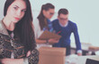 © lenets_tan - Young business people working at office on new project