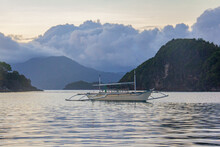 Caramoan Island National Park Sunrise Sunset With Fishing Boat In Bicol Region, Philippines  