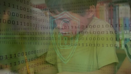 Canvas Print - Animation of padlock and binary data processing over caucasian schoolboy working in classroom