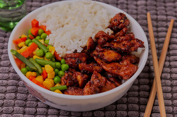 Wall Mural - Teriyaki chicken with rice and mixed vegetables.