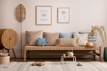 Sunny and bright space of living room with stylish sofa, pillows, coffee table, mock up poster frames, decorations, furnitures and personal accessories. Cozy home decor. Template. Summer vibe.