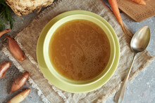 Beef Bone Broth Or Soup On A Table, Top View