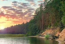 Sandy Shore Of Seliger Lake With Tall Pine Trees Against The Backdrop Of A Beautiful Sunset. Ostashkov, Russia