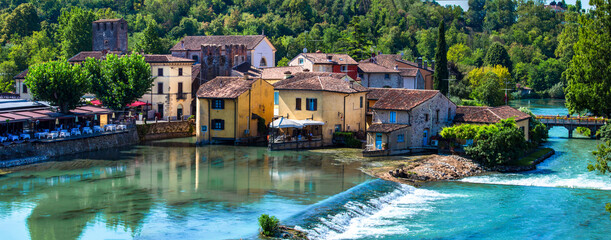 Sticker - Borghetto sul Mincio - one of the most beautiful medieval villages of Italy. colorful houses located in the middle river and waterfalls. Verona province, near Garda Lake