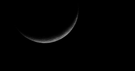 Wall Mural - crescent moon against black night sky background