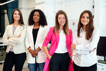 Multiracial Women Standing In Office