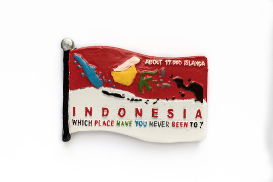 Wall Mural - Colorful souvenir fridge magnet from Indonesia isolated on white background.
