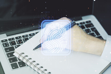 Aufkleber - Abstract creative fingerprint illustration with hand writing in diary on background with laptop, personal biometric data concept. Multiexposure