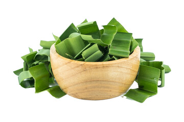 pandan and Chopped pandan in a wooden cup isolated on a white background.