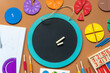Closeup school board, mathematical fractions, pencils, notebook, ruler, accessories for school on brown table. Back to school, education background