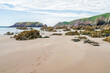 Marloes Sands Beach with rock formations at low tide, Wales