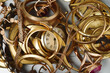 A scrap of gold. Old and broken jewelry, coins, watches of gold and gold-plated