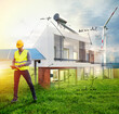 © alphaspirit - Technical at work with a building of a new house