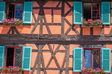 Wall Mural - Colmar alsatian architecture at springtime with flowers, Eastern France