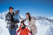 © Odua Images - beautiful asian family walking together in landscape cover with wonderful snow