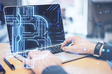 Aufkleber - Close up of businessman hands using laptop with creative glowing bitcoin circuit hologram on blurry background. Cryptocurrency, blockchain and finance concept. Double exposure.