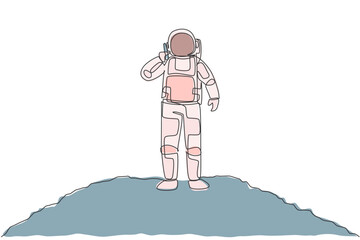Poster - One single line drawing of cosmonaut calling his partner using smartphone in moon surface vector illustration. Astronaut business office with outer space concept. Modern continuous line draw design