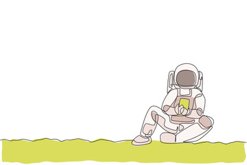 Poster - One continuous line drawing of young spaceman on spacesuit siting relax on moon surface while texting. Astronaut business office with deep space concept. Single line draw design vector illustration