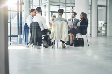 Wall Mural - Teamwork, working together and development with a group or team of business people, colleagues and coworkers in the office. Talking, planning and discussing strategy during a workshop or seminar