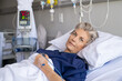 © Rido - Senior woman resting on hospital bed