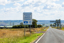 Average Speed Safety Camera Ahead Sign Beside Country Highway