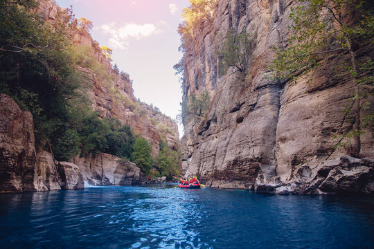 Rafting on rapids on red boat Blue river from Koprulu Tazi canyon, Manavgat Antalya Turkey