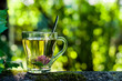 clover tea in a glass mug