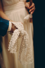 Wall Mural - bride and groom holding hands